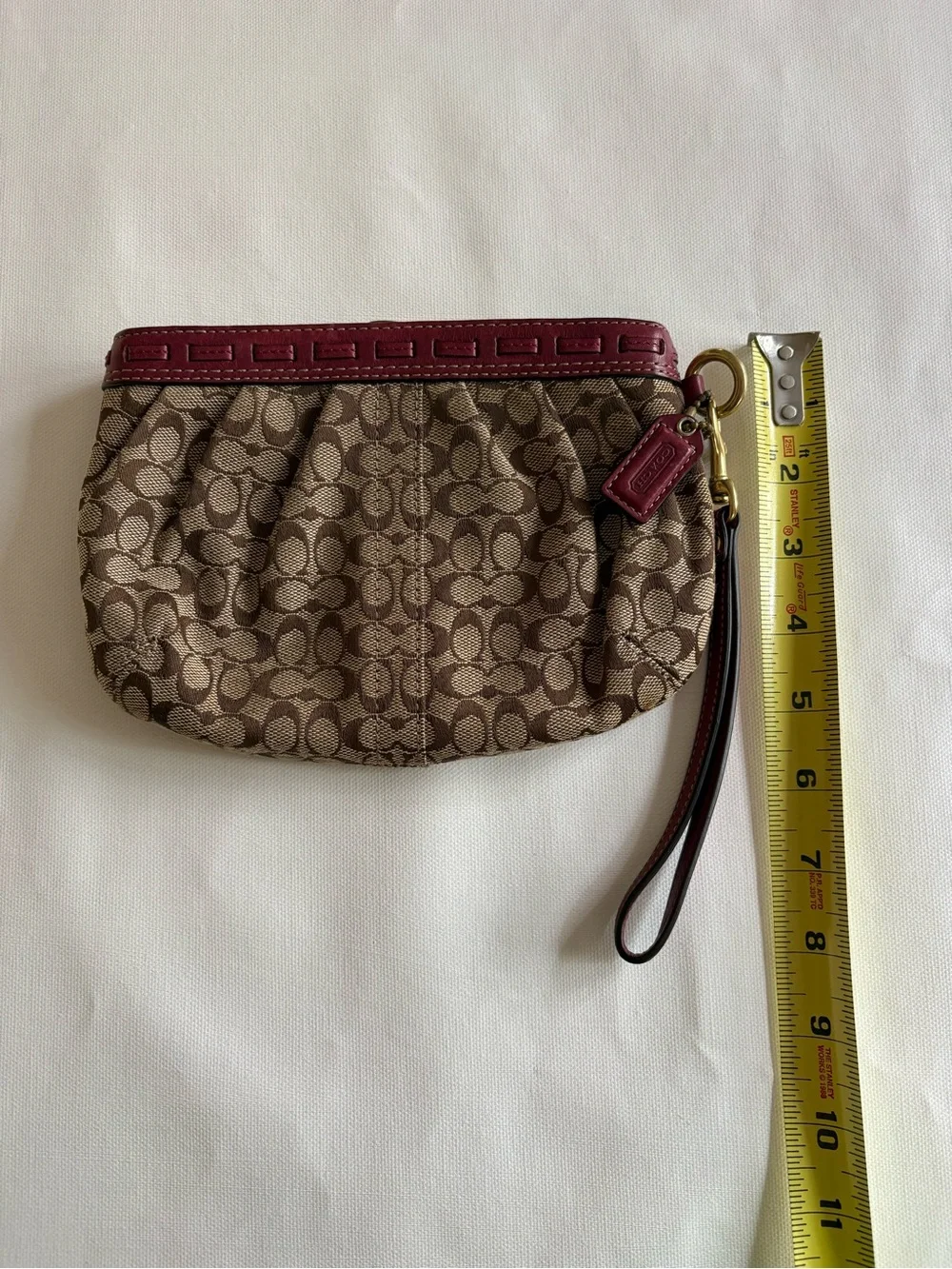 Coach Brown Signature Canvas Wristlet with Burgundy Trim